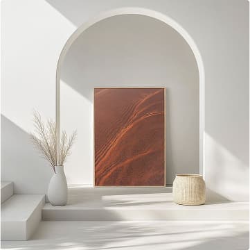 Modern arched alcove displaying a framed ocean print