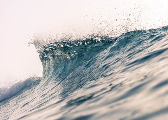 Breaking turquoise wave.